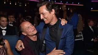 Woody Harrelson, left, and Matthew McConaughey pose at the 66th Primetime Emmy Awards 