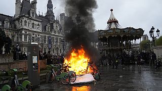 Bicycles burn during a protest outside the Paris City Hall, Friday, April 14, 2023 in Paris.