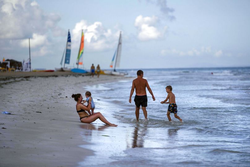 Tourists use the beach at the Iberostar Selection Varadero hotel in Varadero, Cuba, September 2021