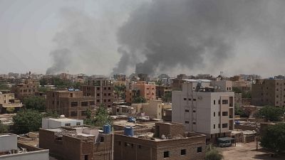 Smoke rises from a central neighborhood of Khartoum, Sudan, Sunday, April 16, 2023