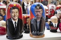 Russian dolls with portraits of Chinese President Xi Jinping and Putin on sale at a shop in Moscow, Russia. 