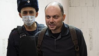 Russian opposition activist Vladimir Kara-Murza is escorted to a hearing in a court in Moscow, Russia, Feb. 8, 2023.
