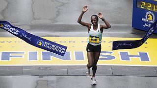 Kenyan double at Boston Marathon, Kipchoge lagging behind