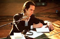 Nick Cave has said that "highly problematic" art can be enjoyable - seen here during the filming of 'One More Time With Feeling'