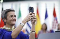 European Commissioner Vice-President Margrethe Vestager takes a photograph during a ceremony in the European Parliament, Tuesday, Nov. 22, 2022 in Strasbourg