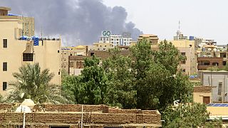 Building's on fire in Sudan.