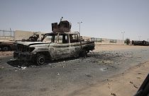 Destroyed military vehicles are seen in southern in Khartoum, Sudan, Thursday, April 20, 2023.