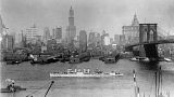 New York, showing the Woolworth Building, center, and the Brooklyn Bridge, in 1925.