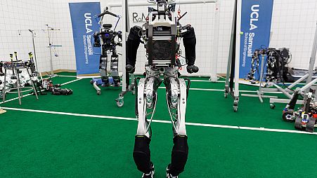 A full-sized humanoid robot named ARTEMIS is shown at UCLA Samueli School of Engineering