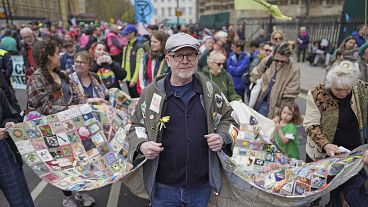 Extinction Rebellion demonstrators take part in a rally on day two of the environmental action group's four days of action, in London, Saturday April 22, 2023 