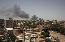 Smoke is seen in Khartoum, Sudan, Saturday, April 22, 2023. The fighting in the capital is continuing after a ceasefire broke down.