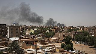 Smoke is seen in Khartoum, Sudan, Saturday, April 22, 2023. The fighting in the capital is continuing after a ceasefire broke down.