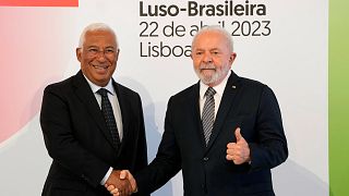 Brazilian President Lula da Silva, right, and Portuguese Prime Minister Antonio Costa pose for photos as they meet for the Portugal-Brazil forum at the Belem Cultural Centre