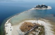 A drone image shows San Biagio island, affected by drought in Lake Garda, near Lido di Manerba, Italy, February 21, 2023.
