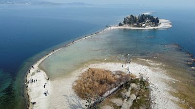 A drone image shows San Biagio island, affected by drought in Lake Garda, near Lido di Manerba, Italy, February 21, 2023.