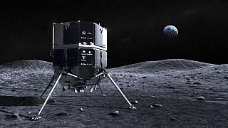 Die ispace - Illustration zeigt das Raumsonde Hakuto auf der Mondoberfläche mit der Erde im Hintergrund.