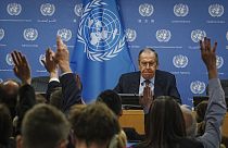 Russia's Foreign Minister Sergey Lavrov watch as reporters raise hands to ask questions during a press conference at the United Nations, Tuesday April 25, 2023 at the UN HQ.