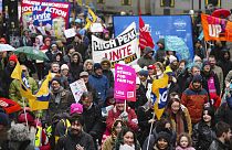 A demonstration in support of strikers is seen in central Manchester, England, Wednesday, Feb. 1, 2023.