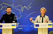 Ukrainian President Volodymyr Zelenskyy, left, and European Commission President Ursula von der Leyen address a media conference after the EU-Ukraine summit in Kyiv, Ukraine, 