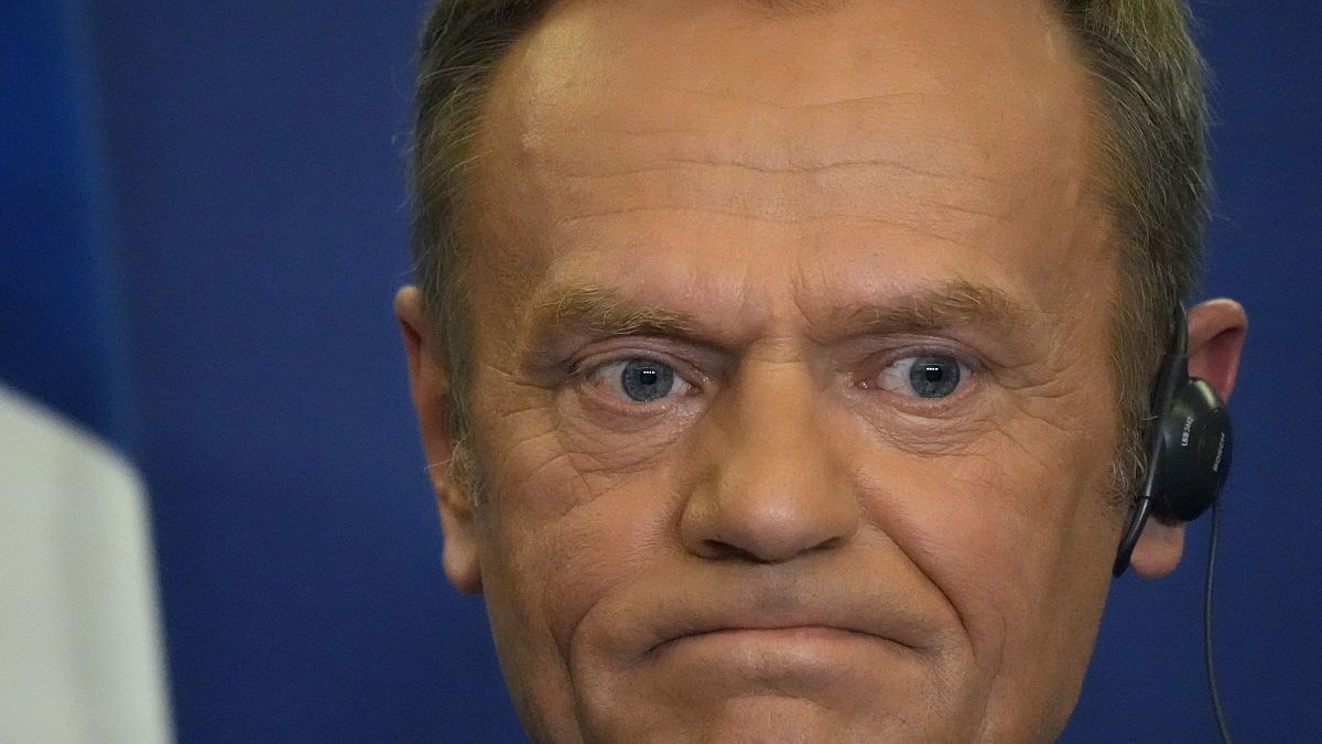 President of the European People's Party Donald Tusk gives a press conference at the end of a meeting in Paris, 10 March 2022