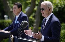 South Korea's President Yoon Suk Yeol listens as President Joe Biden speaks during a news conference in the Rose Garden of the White House on Wednesday, April 26, 2023, 