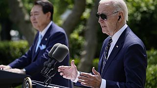 South Korea's President Yoon Suk Yeol listens as President Joe Biden speaks during a news conference in the Rose Garden of the White House on Wednesday, April 26, 2023, 