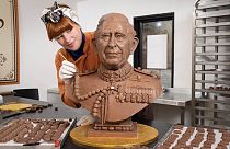 Chocolatier Jennifer Lindsey-Clarke added the finishing touches to bust of King Charles III