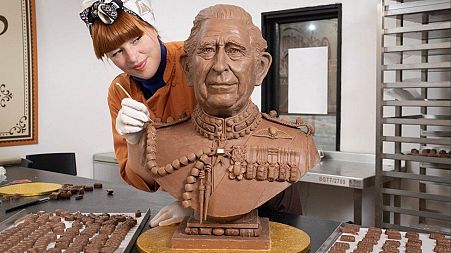 Chocolatier Jennifer Lindsey-Clarke added the finishing touches to bust of King Charles III