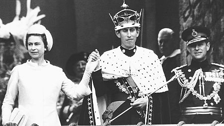 The now King Charles in full royal regalia at his investiture at Caernarfon Castle in 1969