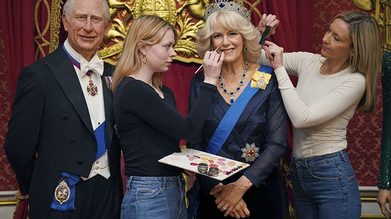 The wax figure of Camilla stands alongside that of her husband King Charles III