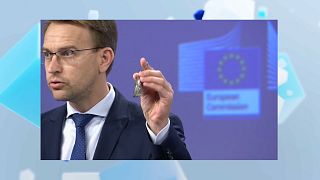 Peter Stano, EU foreign affairs spokesman, with a shrapnel keyring made by Ukrainian children. April 28, 2023