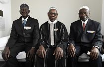 Ousmane Sagna, Oumar Dieme, and Guorgui M' Bodji, (left to right) African war veterans who fought for France, near Paris in 2016.