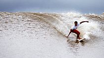 Surfing the 'Pororoca' tidal surge in Brazil