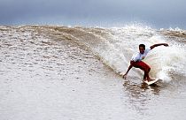Surfing the 'Pororoca' tidal surge in Brazil