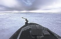 Spy planes and warships are the latest signs of climate change in the Arctic.