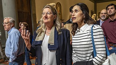 Hope Carrasquilla, right, with Cecilie Hollberg, director of Florence's Galleria dell'Accademia museum looking at the David statue