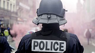 Police officer stand during a demonstration in Lille, northern France. 