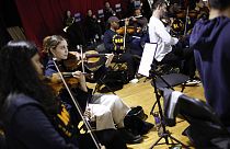 Members of the Brixton Chamber Orchestra rehearse for coronation weekend performances in London, Friday, April 21, 2023. 