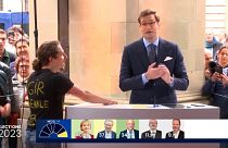 Climate activist interrupts Swiss public debate on live television