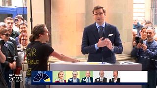 Climate activist interrupts Swiss public debate on live television