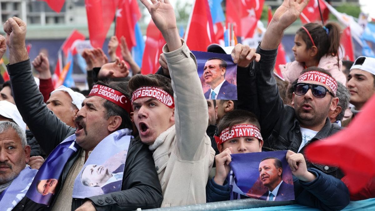 Supporters of Turkish President Recep Tayyip Erdogan cheer during his election campaign rally in Ankara, on April 30, 2023.
