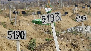 Nov. 16, 2022 image from video shows some of the new graves which have been dug since the Russian siege of Mariupol began.