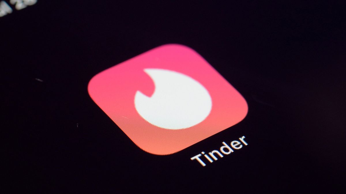 FILE - This Tuesday, July 28, 2020, file photo shows the icon for the Tinder dating app on a device in New York.