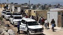 A UN convoy arrives at a camp in Idlib province, Syria, Wednesday, May 3, 2023.