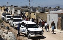 A UN convoy arrives at a camp in Idlib province, Syria, Wednesday, May 3, 2023.