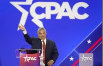 Hungarian Prime Minister Viktor Orban waves has he walks onto stage to speak at the Conservative Political Action Conference (CPAC) in Dallas. 4 August 2022