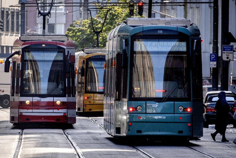 Trams roll through the city centre of Frankfurt, Germany.