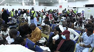 Nigerians arrive home after fleeing fighting in Sudan