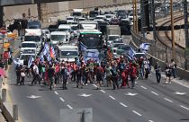 Israelis block roads in protest against Netanyahu legal plan in Tel Aviv, Israel.