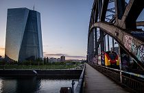 A tram drives past the European Central Bank building in Frankfurt, Germany, Tuesday, May 2, 2023. 